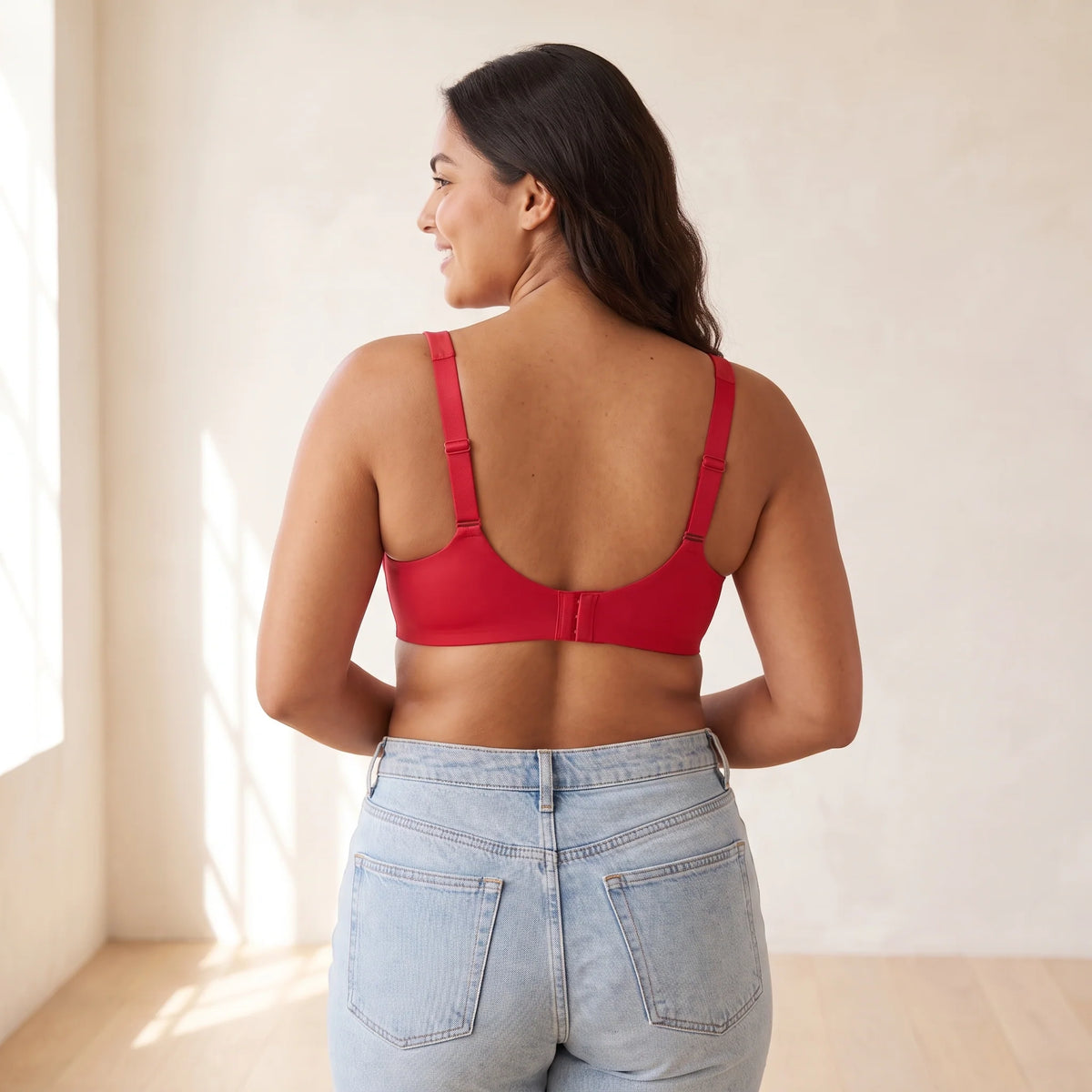Back view of the Cerise red Kischt Camille balconette bra with adjustable straps and a smooth hook-and-eye back band