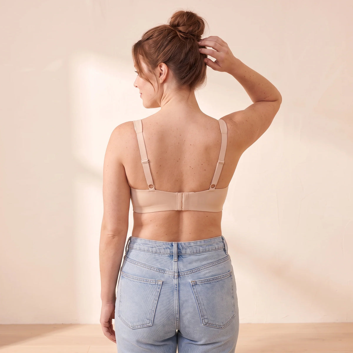 Back view of the Crème nude beige Kischt Camille balconette bra with adjustable straps and a smooth hook-and-eye back band