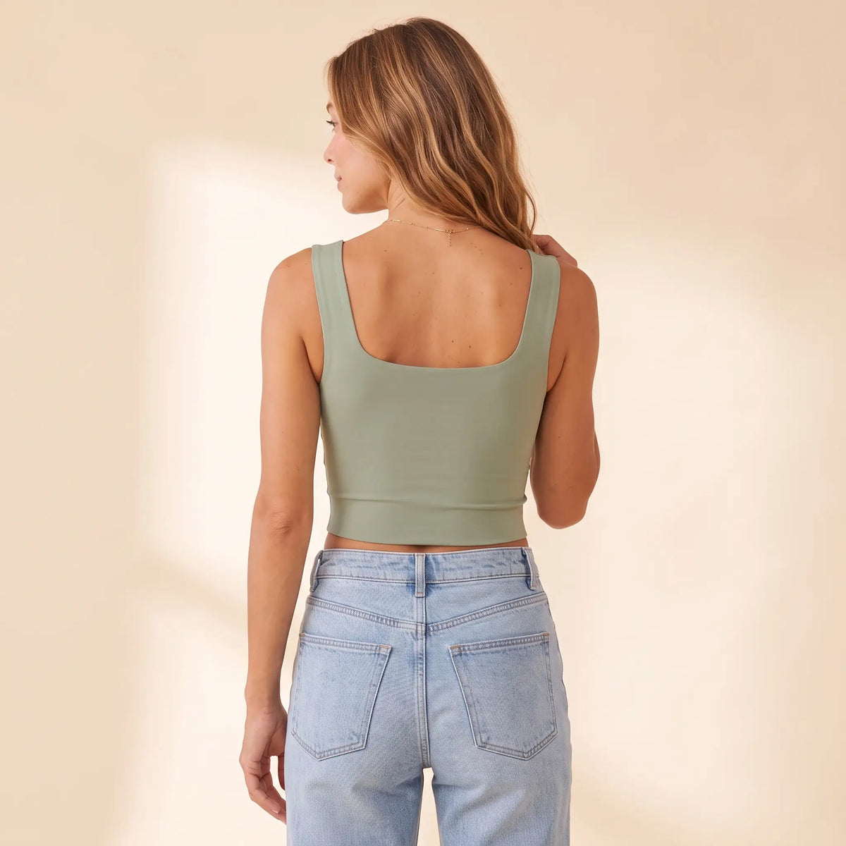 Back view of the Sauge sage green Kischt Elodie square neck crop tank with wide straps and a smooth back with no bra lines