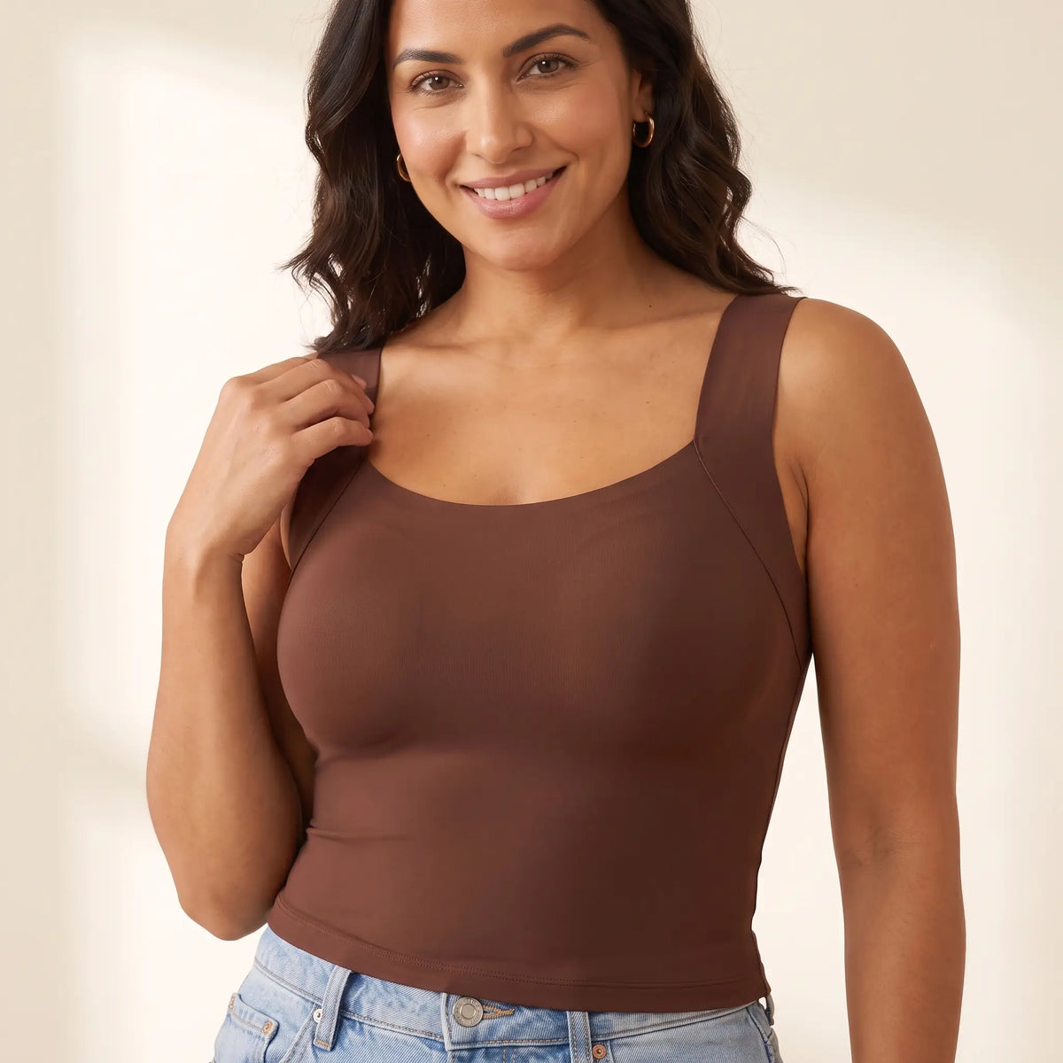 Close-up of the Mocha brown Kischt Estelle tank top showing the wide straps, soft scoop neckline and a smooth front with the built-in bra hidden inside