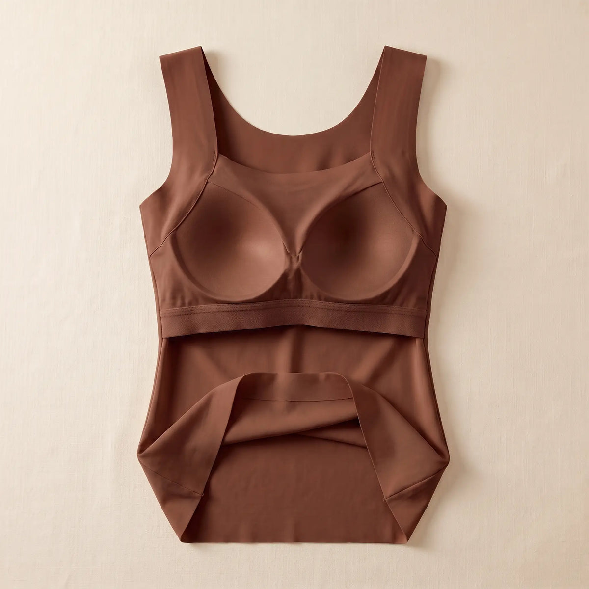 Inside of the Mocha brown Kischt Estelle tank top: a built-in shelf bra with soft padded cups enclosed in a smooth lining on an elastic band