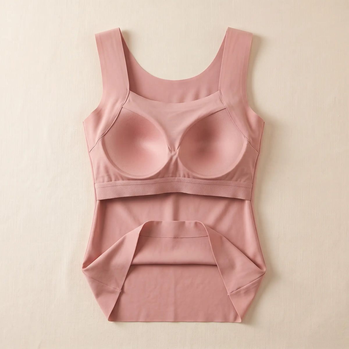 Inside of the Rosé dusty pink Kischt Estelle tank top: a built-in shelf bra with soft padded cups enclosed in a smooth lining on an elastic band