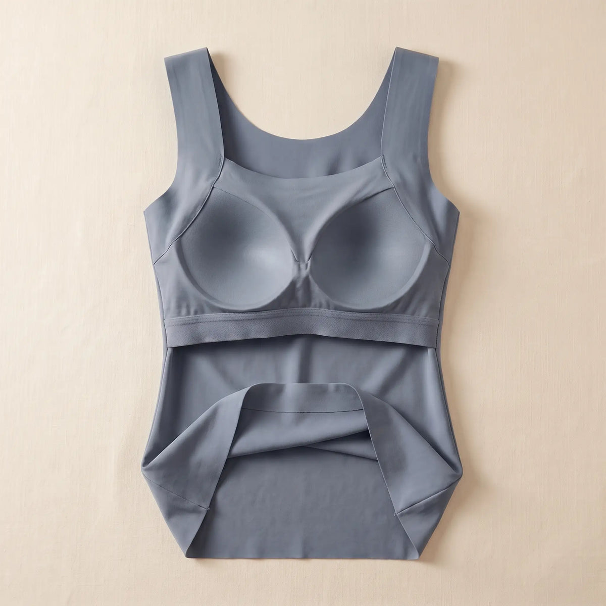 Inside of the Slate blue-grey Kischt Estelle tank top: a built-in shelf bra with soft padded cups enclosed in a smooth lining on an elastic band
