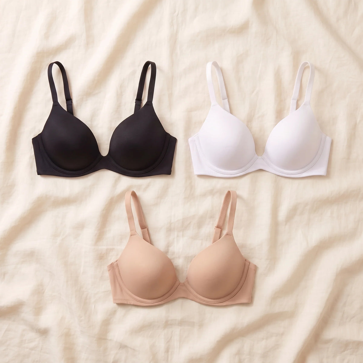 Kischt Juliette unlined plunge bra 3-pack: The Everyday Trio in Noir black, Blanc white and Crème nude