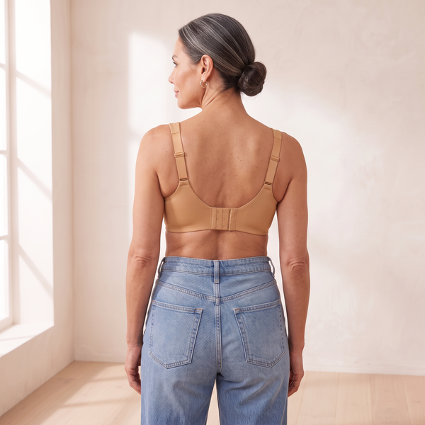 Back view of the Almond tan Kischt Margaux full coverage bra with wide straps and a wide hook-and-eye back band