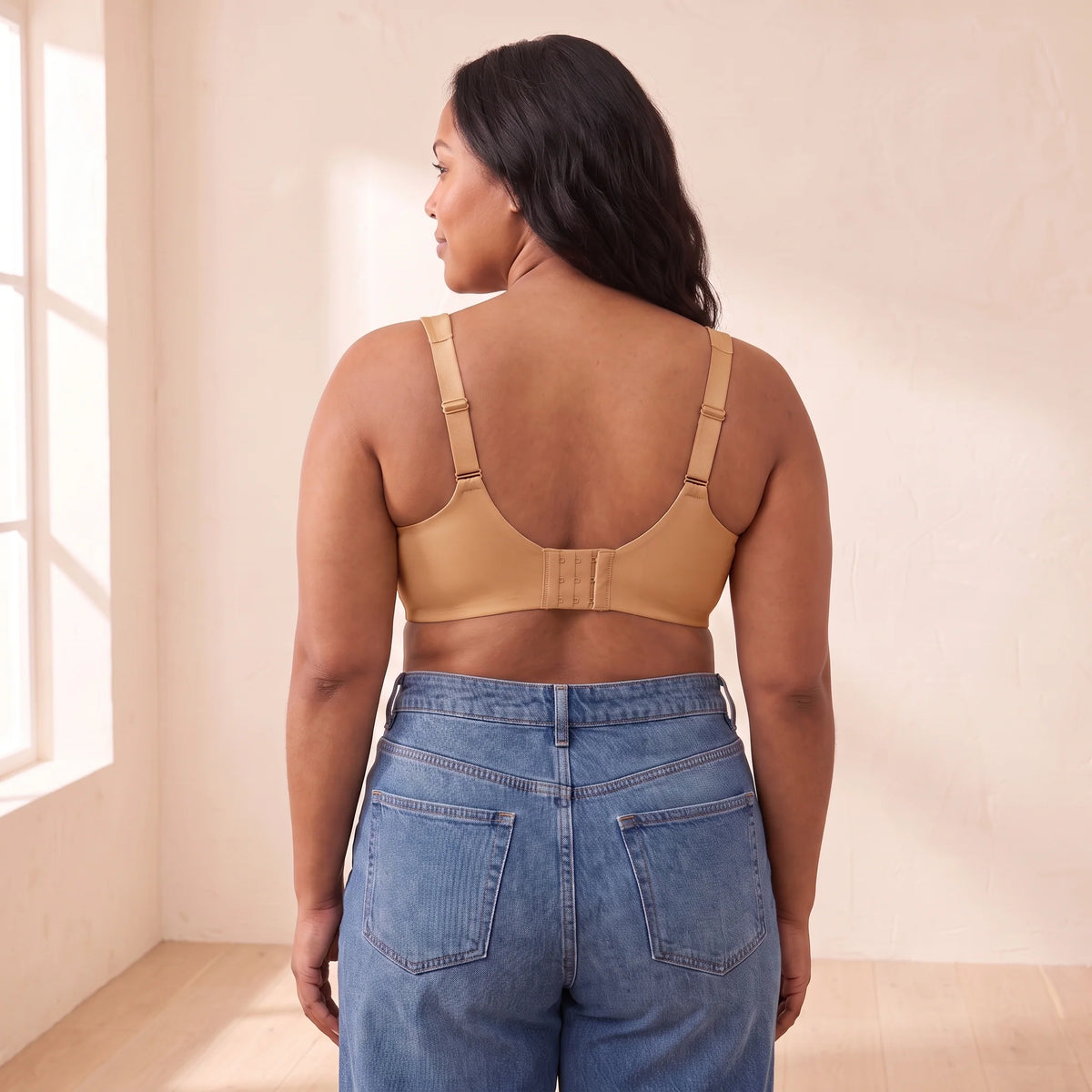 Back view of the Almond golden tan Kischt Margaux minimizer bra with adjustable straps and a smooth hook-and-eye back band